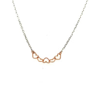 handmade necklace with 5 tiny 14K rose gold wire hearts on oxidized sterling silver chain