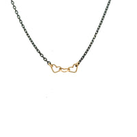 image of handmade necklace with 3 tiny 14K yellow gold wire hearts on oxidized sterling silver chain